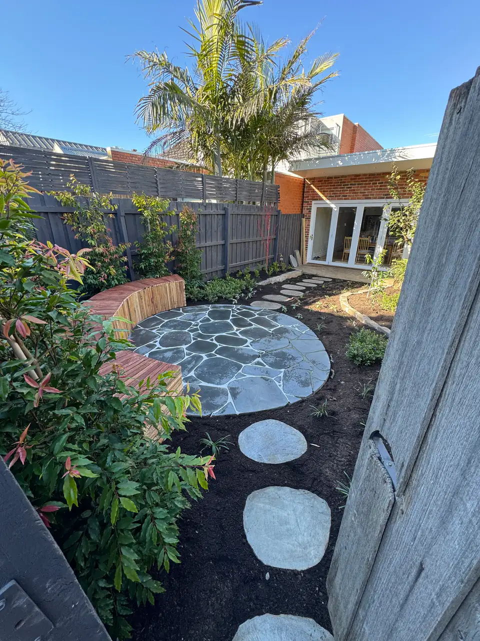 Low-maintenance planting by GardenScaping in Carlton North